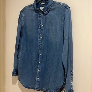 denim button up with white buttons